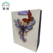 Paberist lindiga käepidemetega kinkekotid